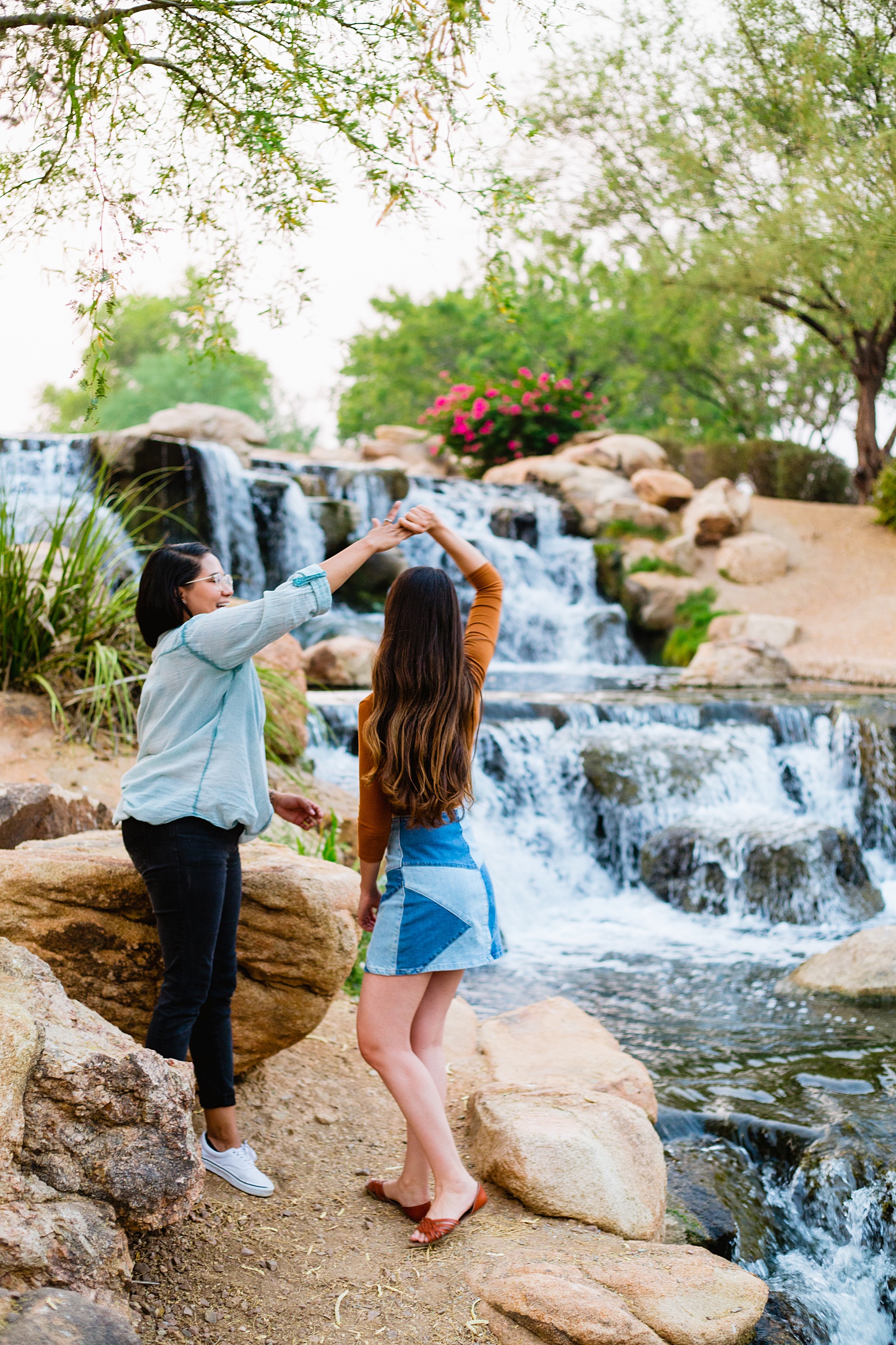LGBTQ+ couple pose for their Anthem Park engagement session by Phoenix wedding photographer PMA Photography.