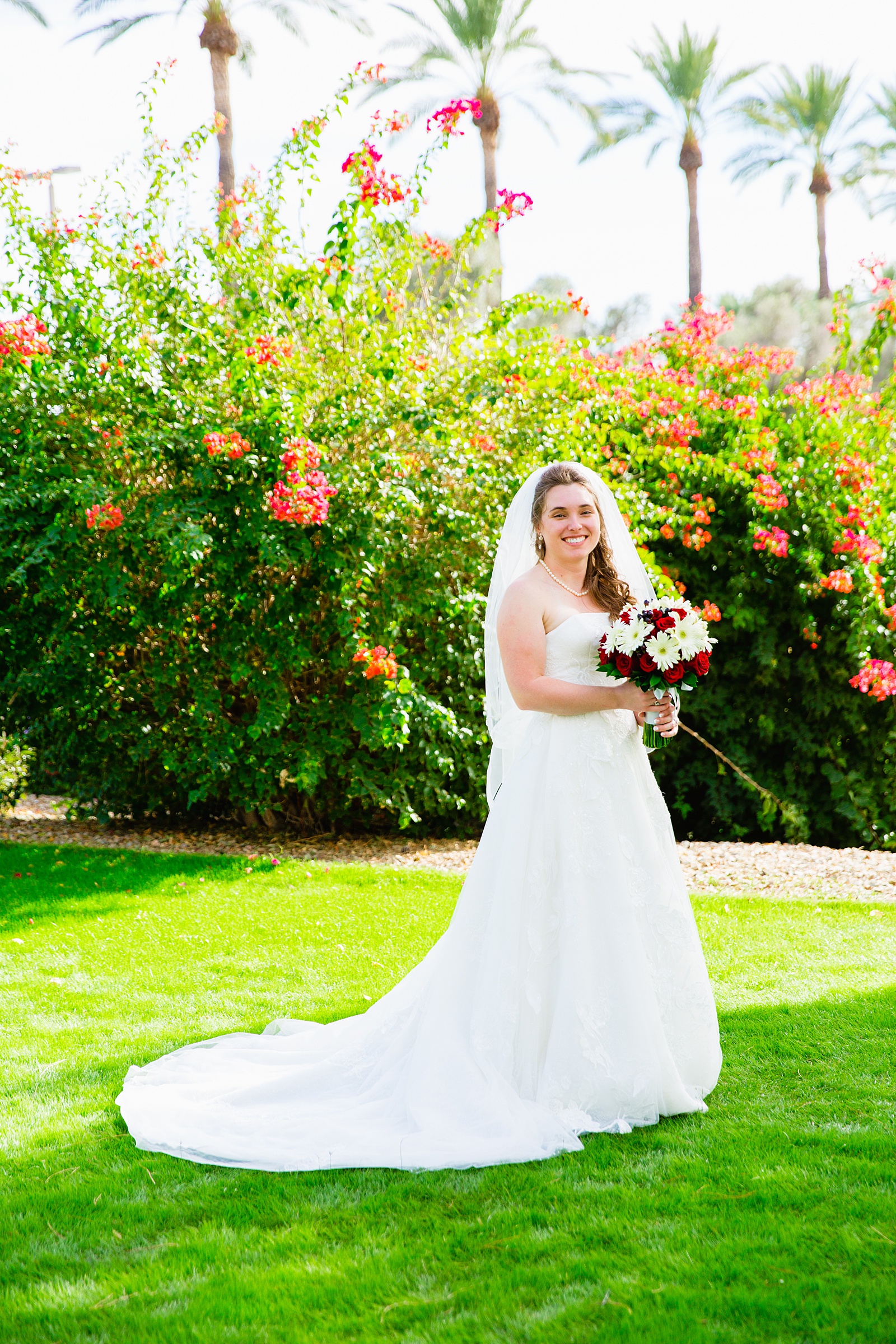 Bride's romantic lace wedding dress for her Ocotillo Oasis wedding by PMA Photography.