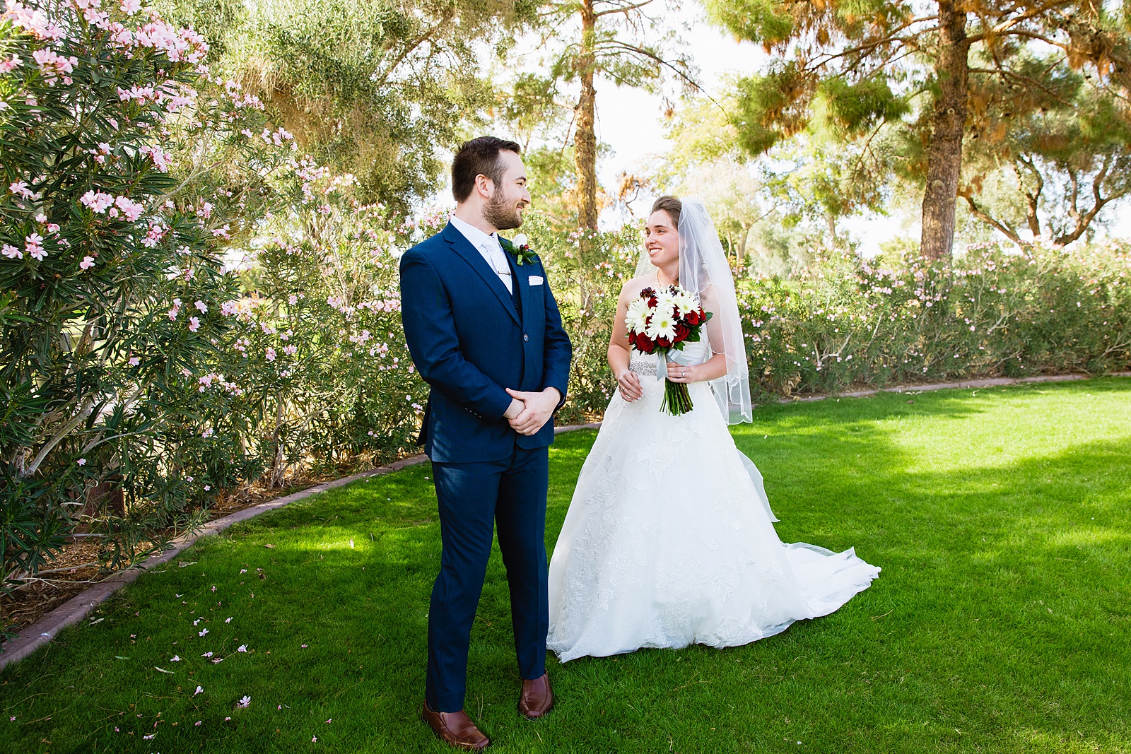 Bride and Groom's first look at Ocotillo Oasis by Phoenix wedding photographer PMA Photography.