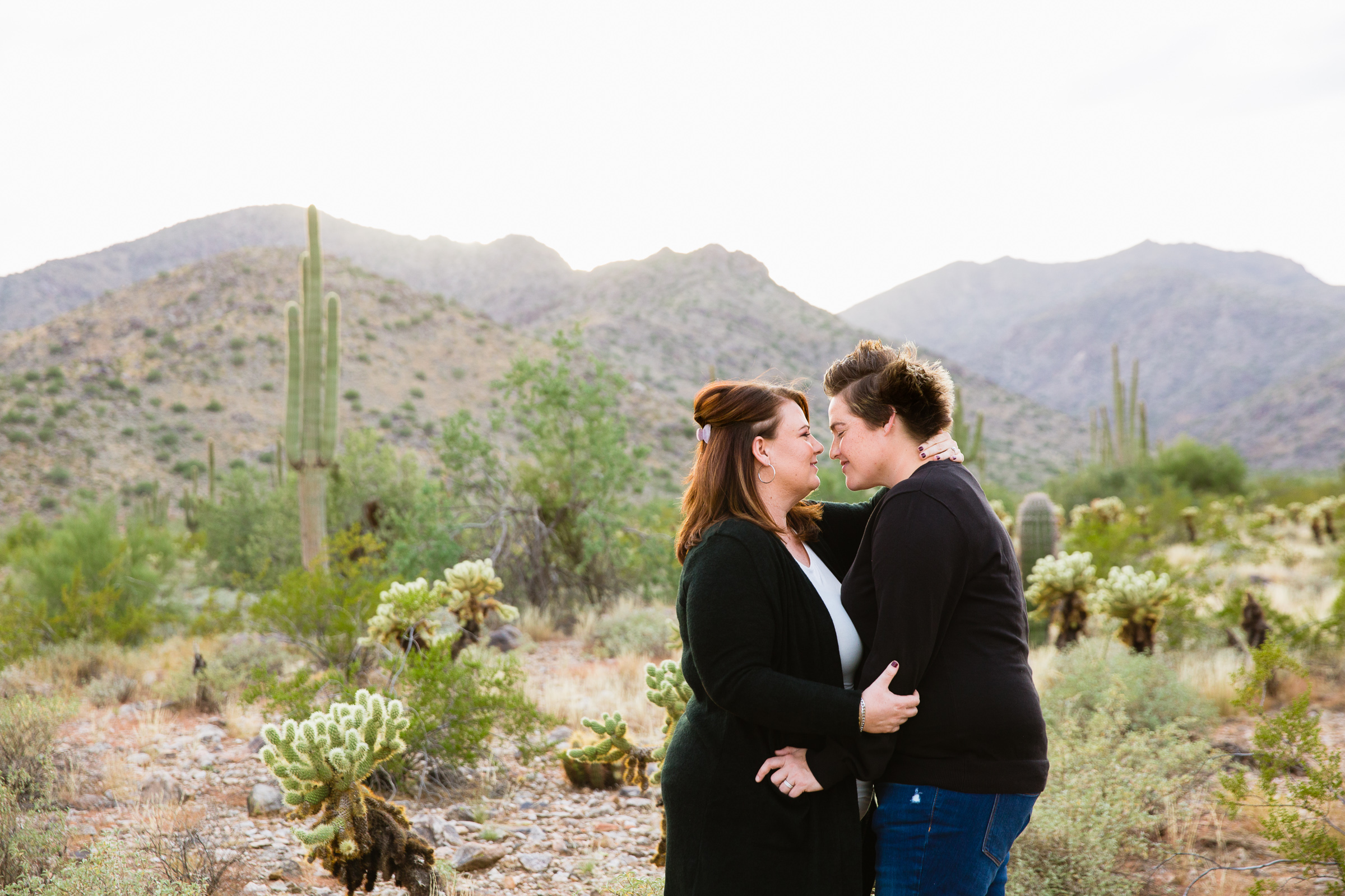 Couple share an intimate moment at their Waddell anniversary session by Arizona engagement photographer PMA Photography.