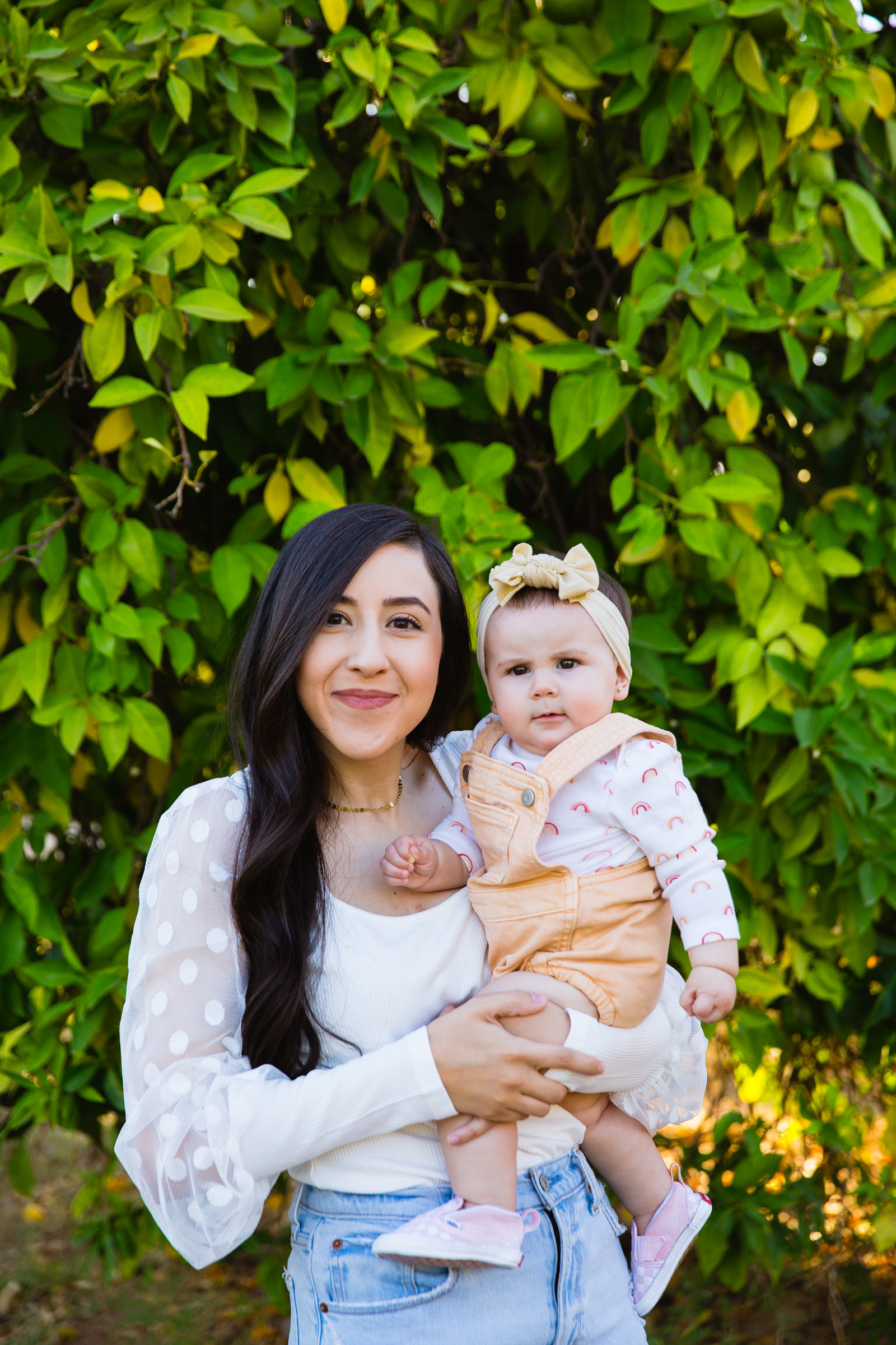 Mother and daughter together during their Glendale family session by Arizona family photographer PMA Photography.