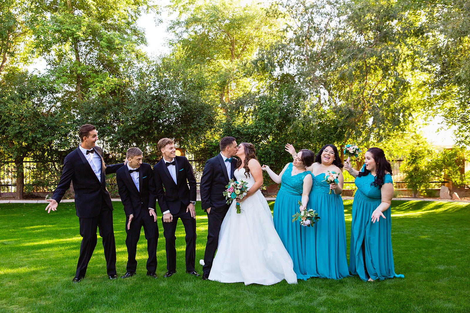 Bridal party having fun together at Stonebridge Manor weding by Arizona wedding photographer PMA Photography.