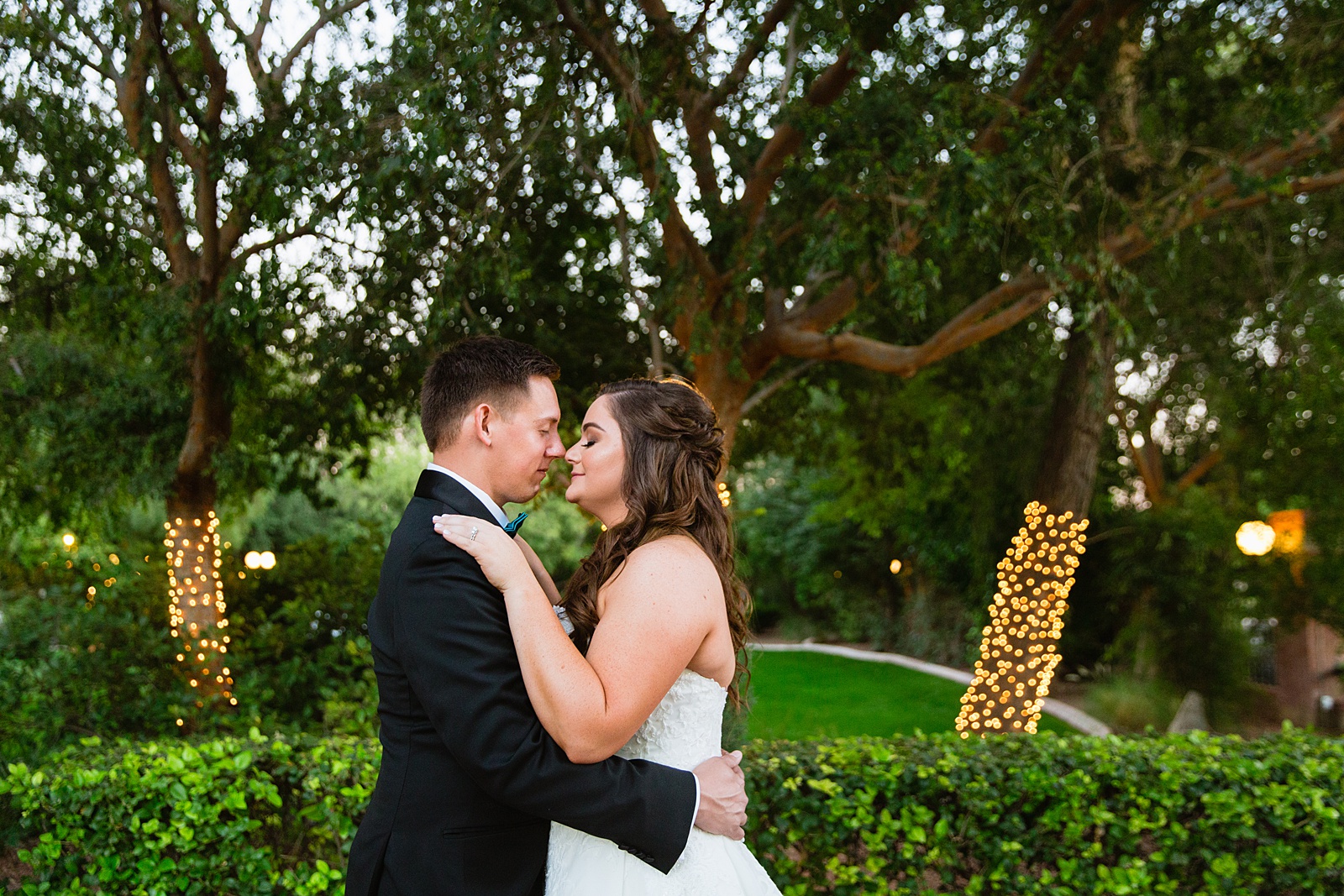 Bride and Groom share an intimate moment during their Stonebridge Manor wedding by Mesa wedding photographer PMA Photography.