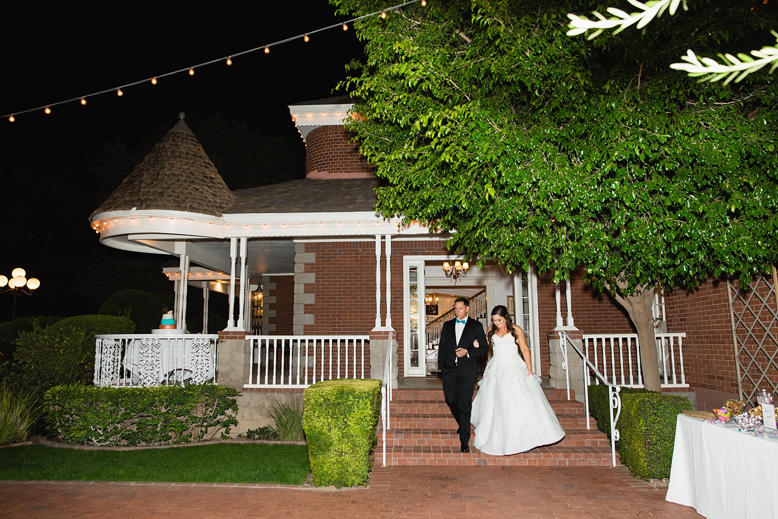 Couple's grand entrance at Stonebridge Manor wedding reception by Mesa wedding photographer PMA Photography.