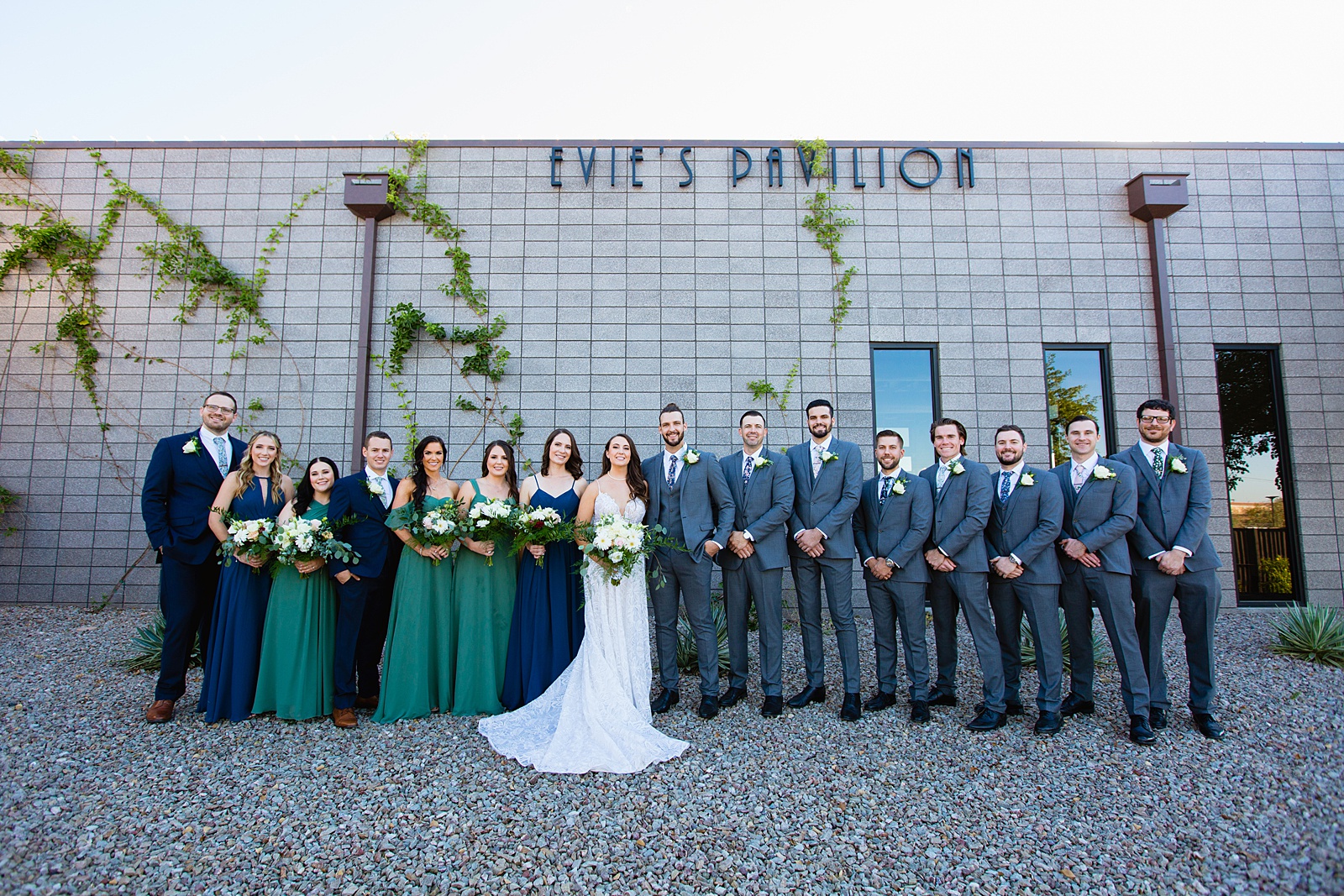 Mixed gender bridal party together at a Papago Events wedding by Arizona wedding photographer PMA Photography.