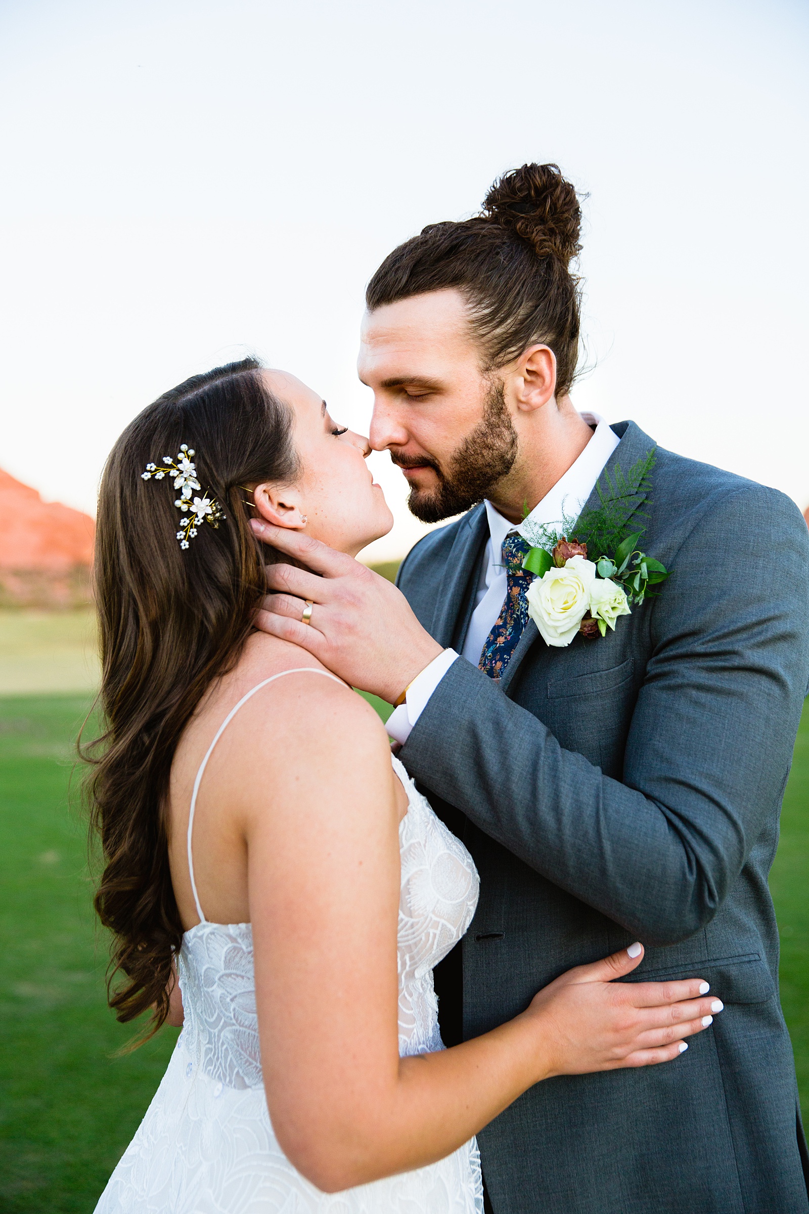 Bride and groom share an intimate moment during their Papago Events wedding by Phoenix wedding photographer PMA Photography.