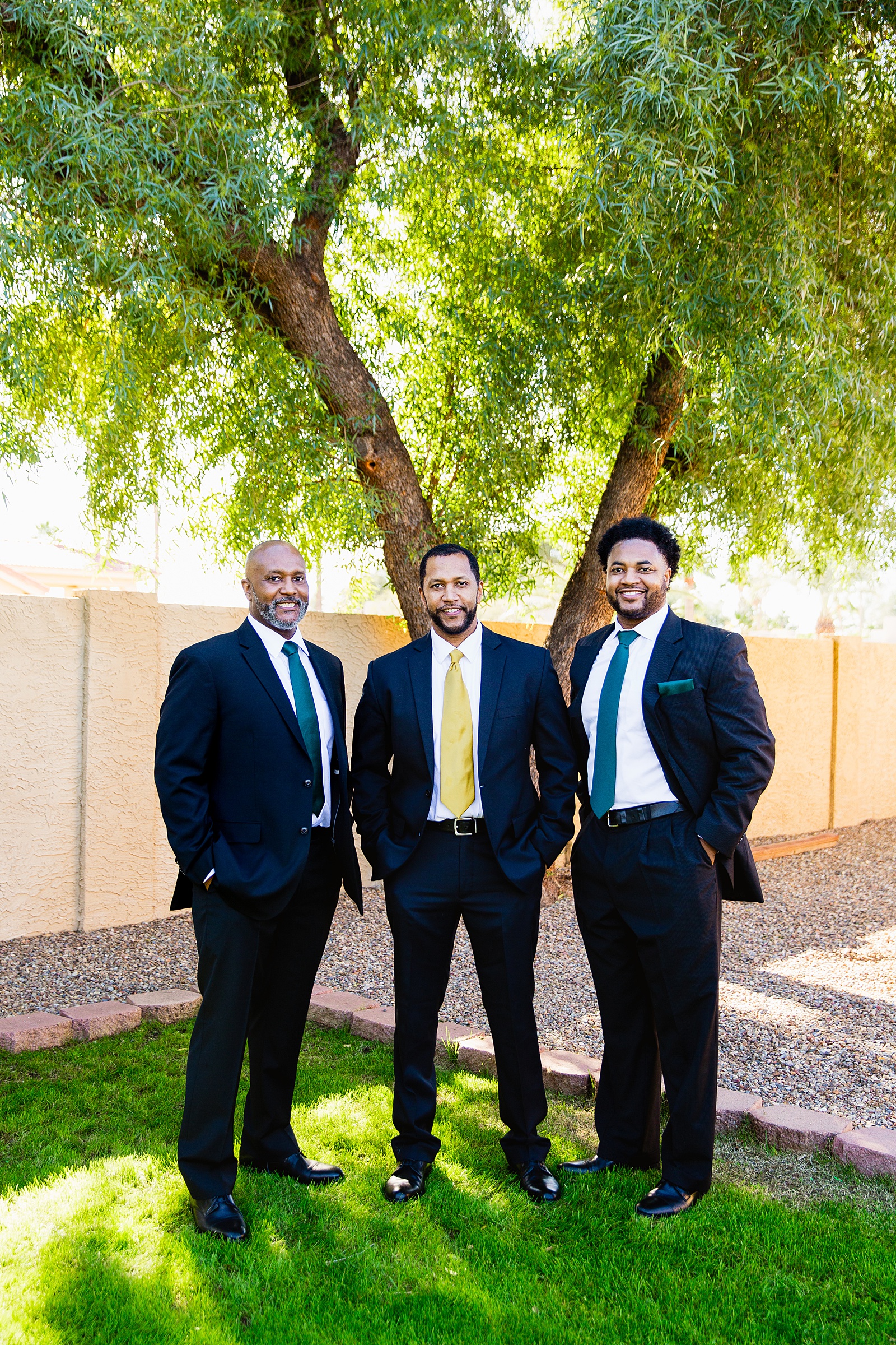Groom and groomsmen together at a Backyard Micro wedding by Arizona wedding photographer PMA Photography.
