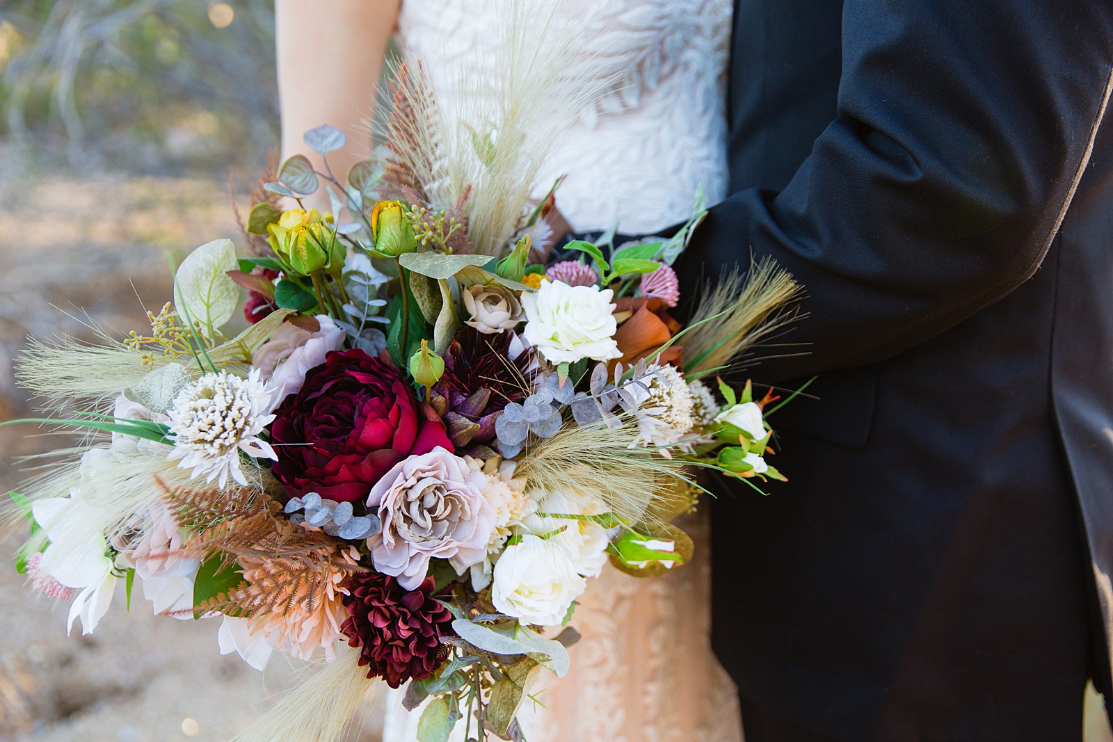 Brides boho inspired faux flower bouquet by PMA Photography.
