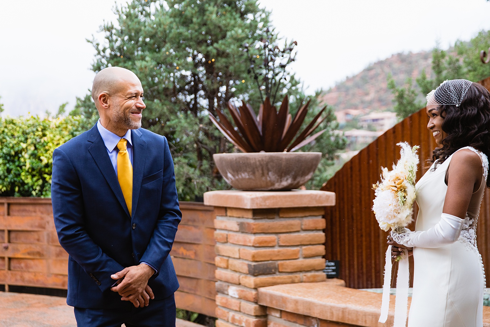 Newlyweds's first look at Agave of Sedona by Arizona wedding photographer PMA Photography.