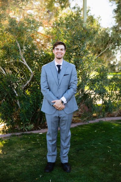 Groom's grey suit for his Ocotillo Oasis wedding by PMA Photography.