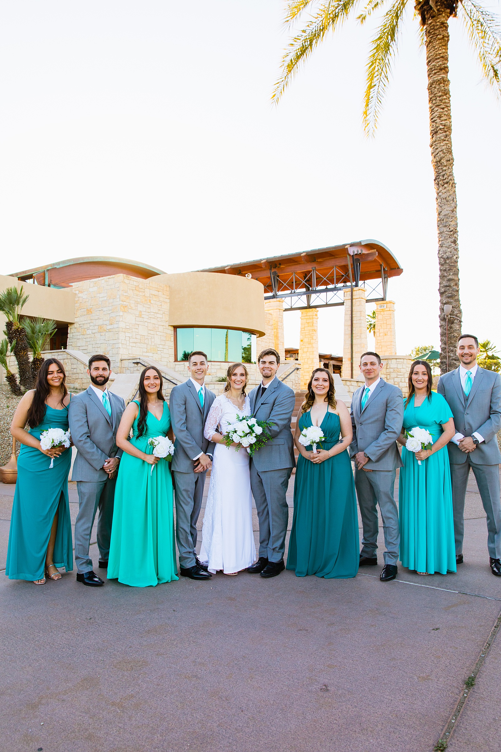 Bridal party together at a Ocotillo Oasis wedding by Arizona wedding photographer PMA Photography.