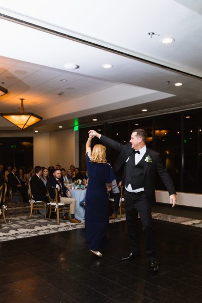 Parent dances at Troon North wedding reception by Scottsdale wedding photographer PMA Photography.