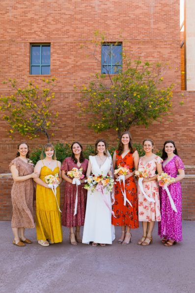 Bride and bridesmaids together at a Arizona Historical Society wedding by Arizona wedding photographer PMA Photography.