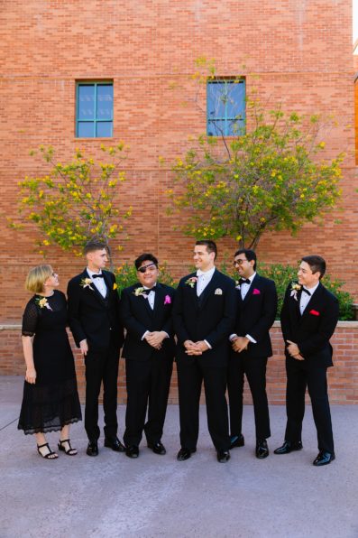 Groom and mixed gender bridal party together at a Arizona Historical Society wedding by Arizona wedding photographer PMA Photography.
