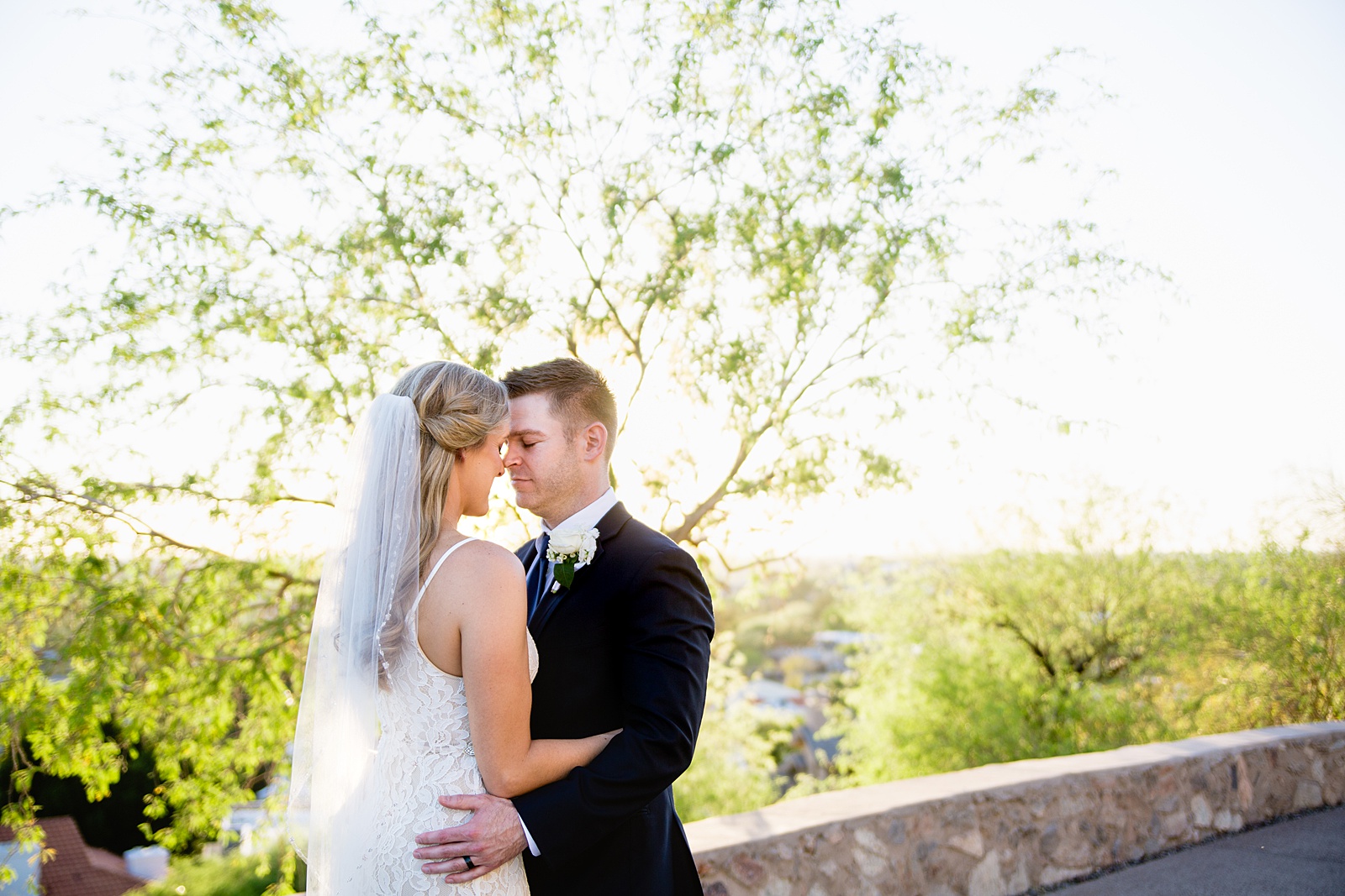 Bride and Groom share an intimate moment during their Wrigley Mansion wedding by Phoenix wedding photographer PMA Photography.