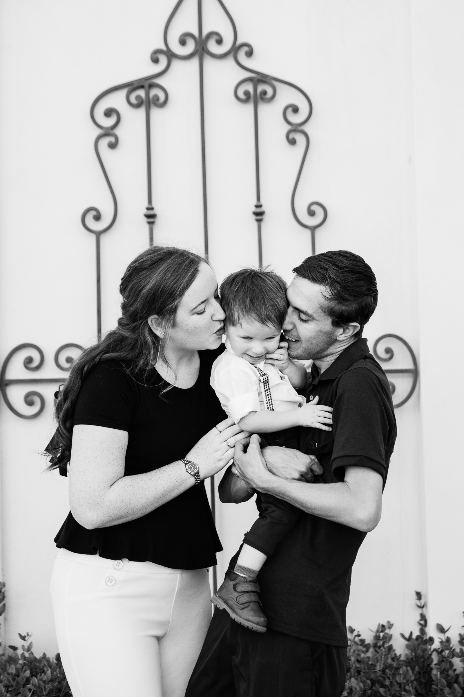 Family having fun together at their downtown family session by Verrado family photographer PMA Photography.