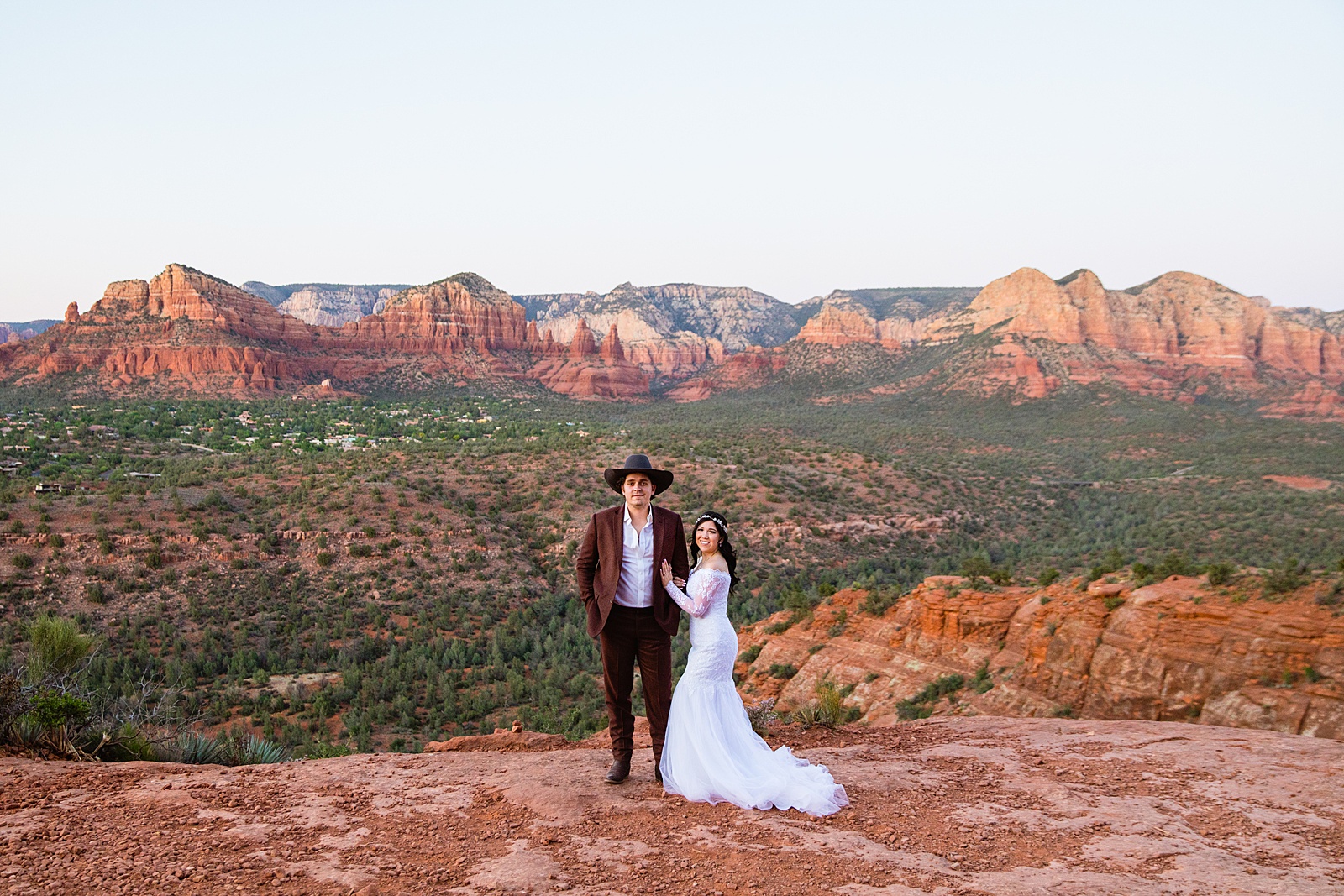 Bride and Groom pose during their Cathedral Rock elopement by Arizona elopement photographer PMA Photography.
