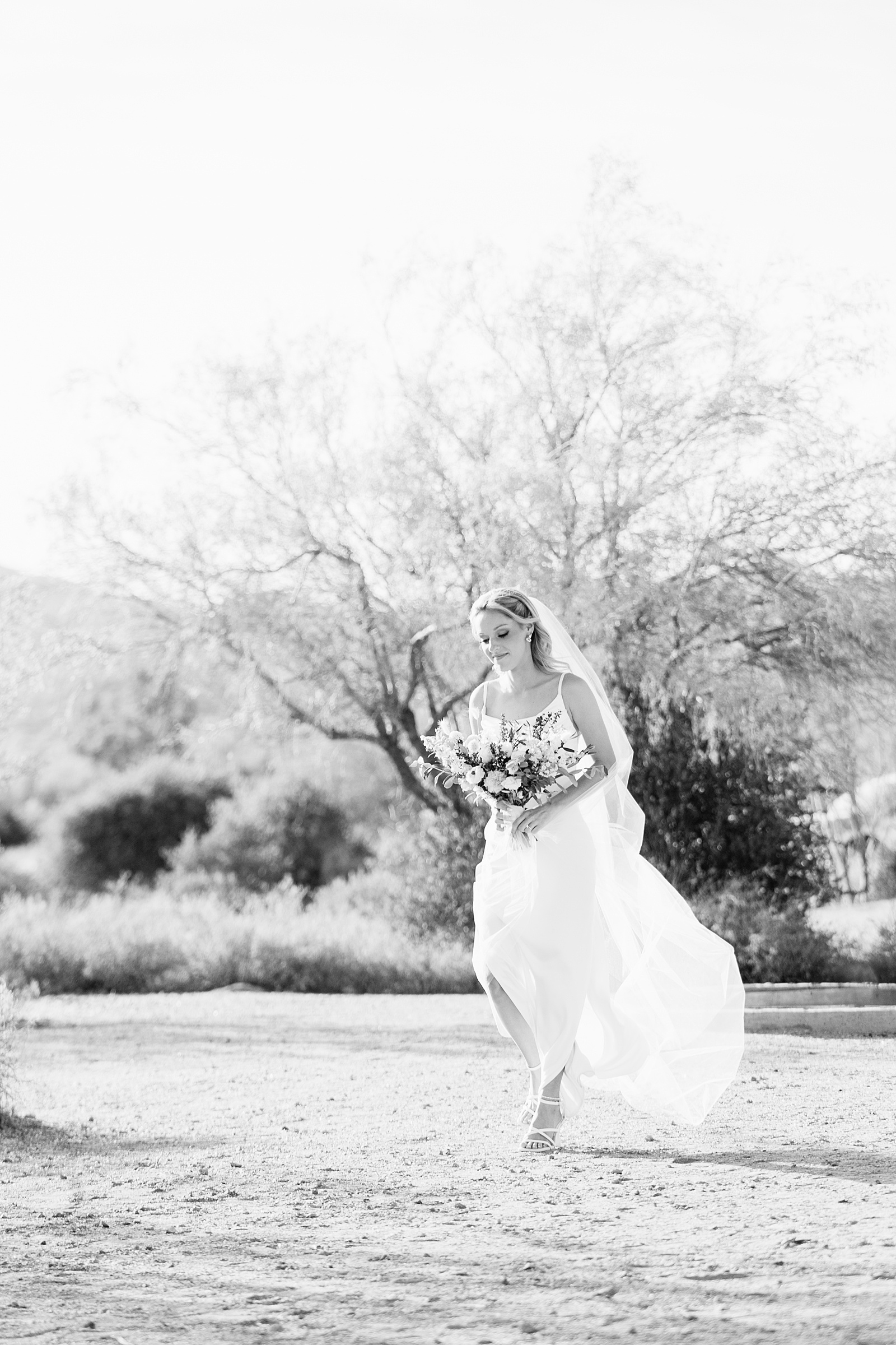 Bride walking down aisle during Superstition Mountain Micro wedding ceremony by Phoenix wedding photographer PMA Photography.