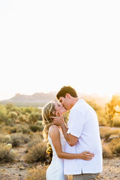 Bride and groom share a kiss during their Superstition Mountain Micro wedding by Lost Dutchman wedding photographer PMA Photography.