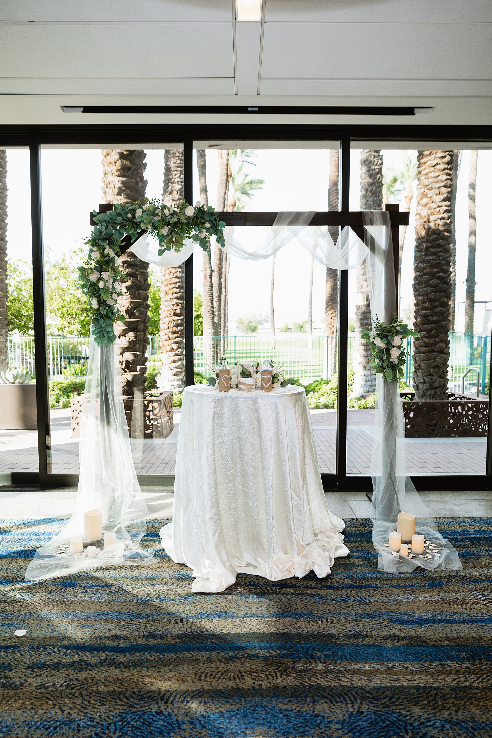 Wedding ceremony at Hyatt Regency Scottsdale Resort & Spa At Gainey Ranch by Phoenix wedding photographer PMA Photography.