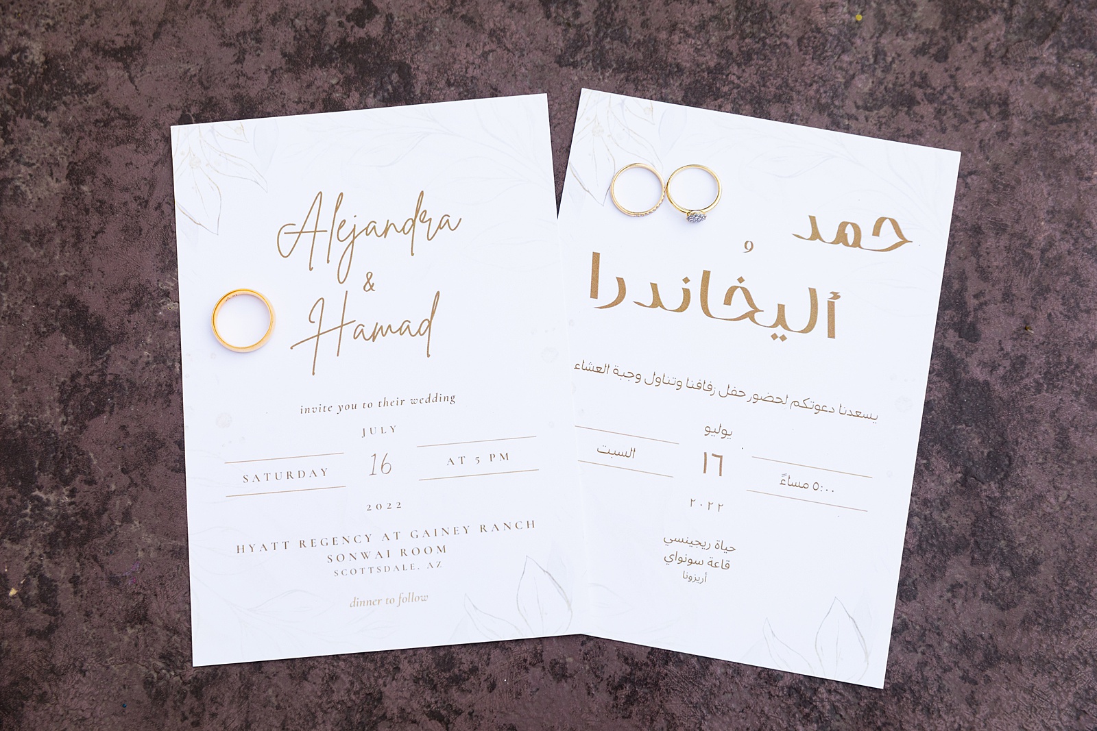 Bilingual simple, gold wedding invitations with wedding rings by PMA Photography.