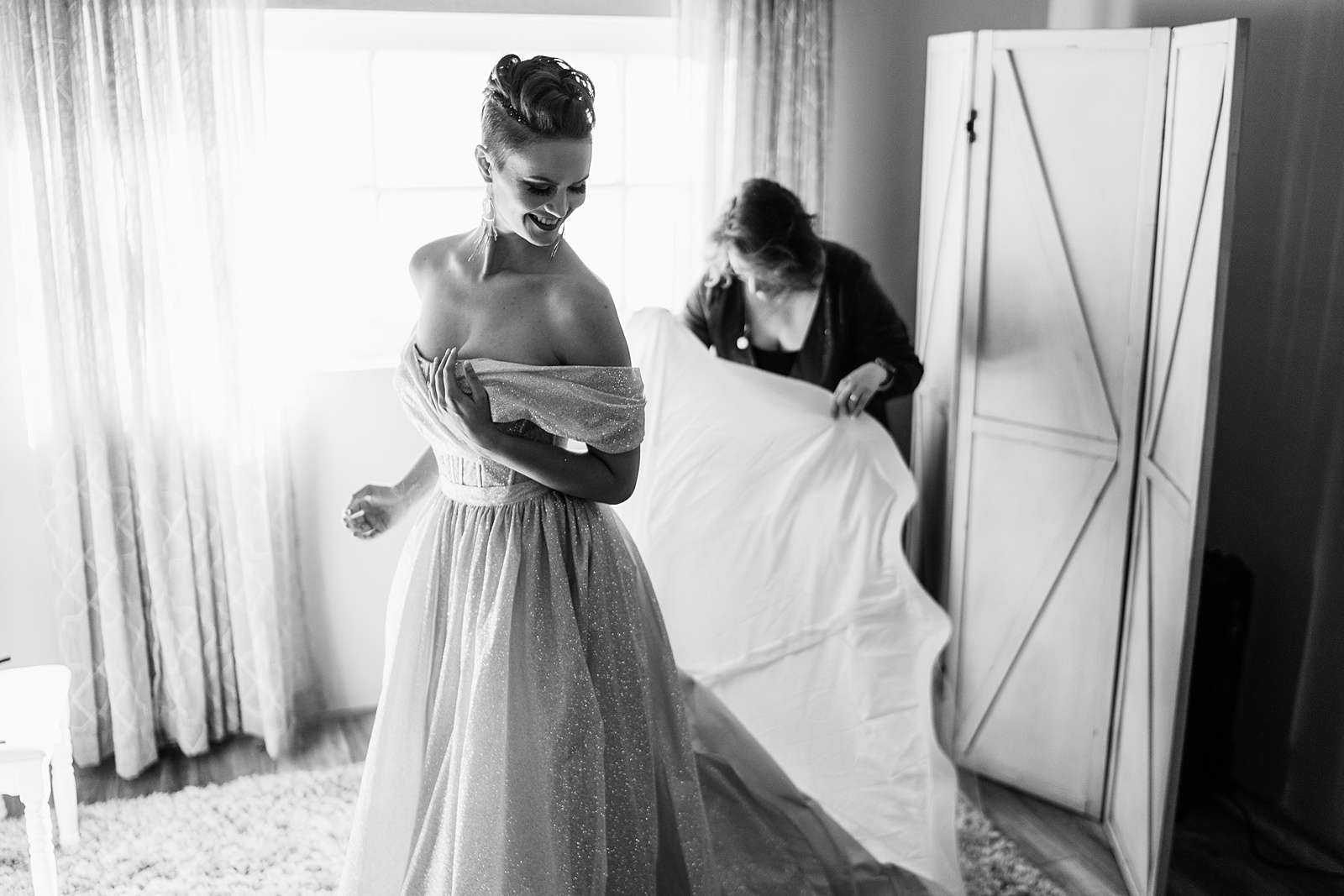 Bride and her mother getting ready in Cinderella inspired wedding dress for her Mortimer Farms wedding by PMA Photography.