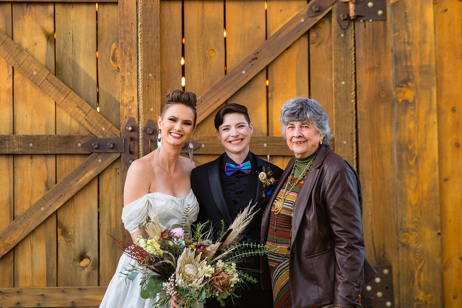 Brides' families together at a Mortimer Farms wedding by Arizona wedding photographer PMA Photography.
