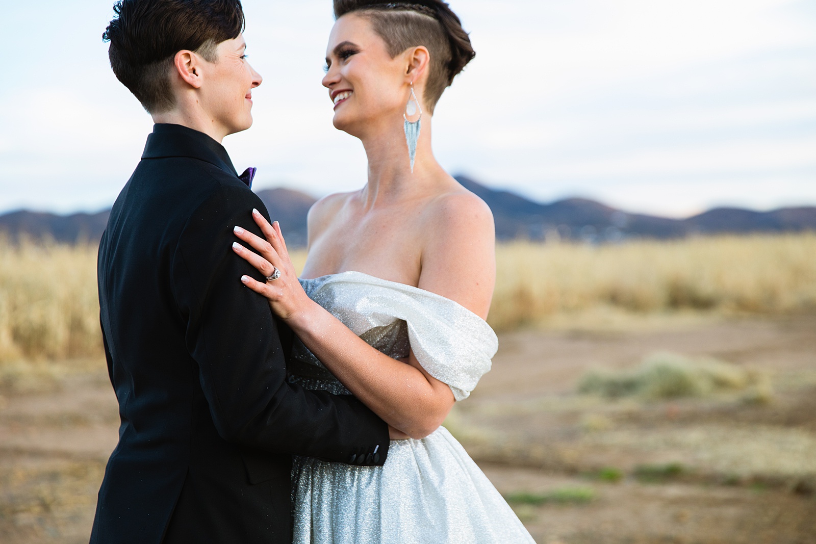 Same sex couple's first look at Mortimer Farms by Arizona wedding photographer PMA Photography.