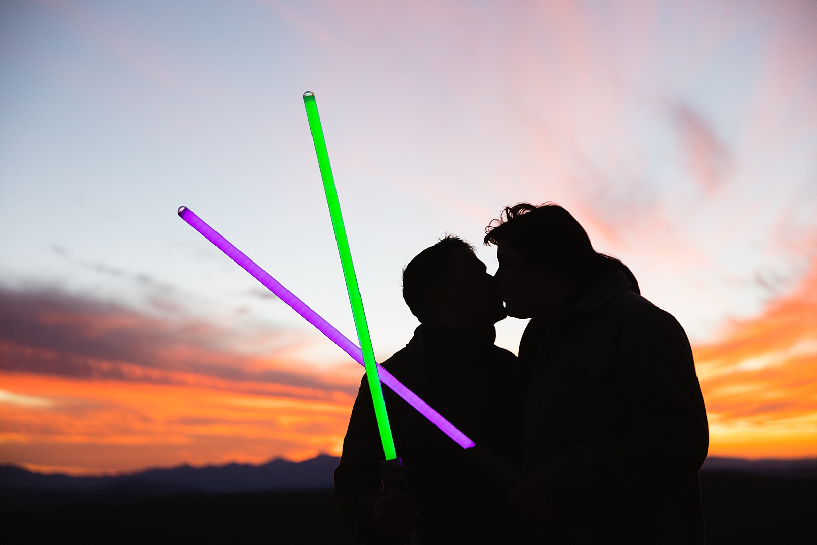 Star Wars Inspired couple share a kiss during their Payson engagement session by Arizona wedding photographer PMA Photography.