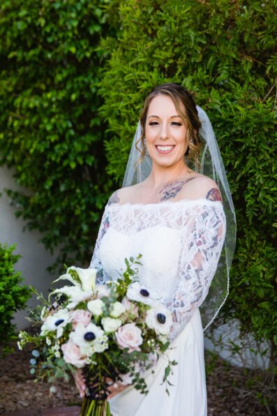 Bride's lacie wedding dress for her backyard wedding by PMA Photography.