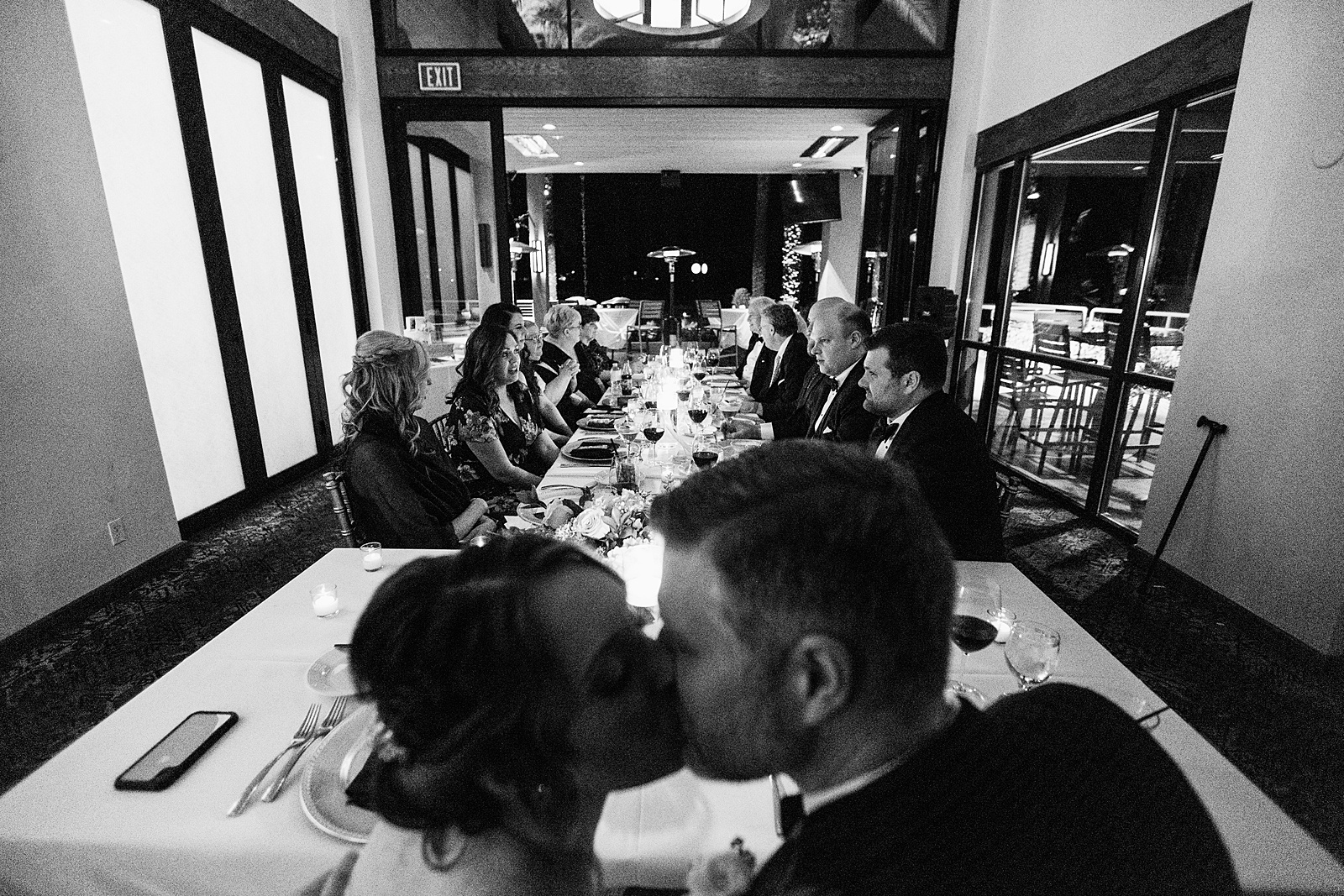 Sweetheart table at backyard wedding reception by Arizona wedding photographer PMA Photography.