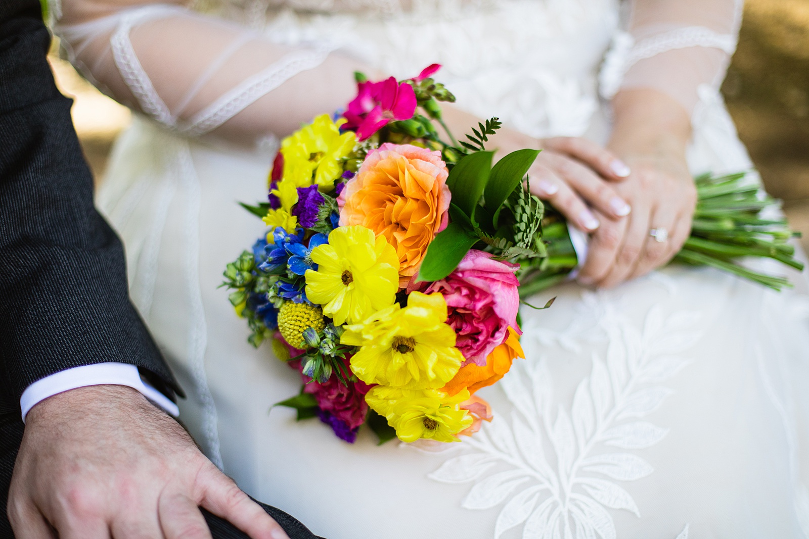 Bride's bright and bold colorful bouquet by PMA Photography.