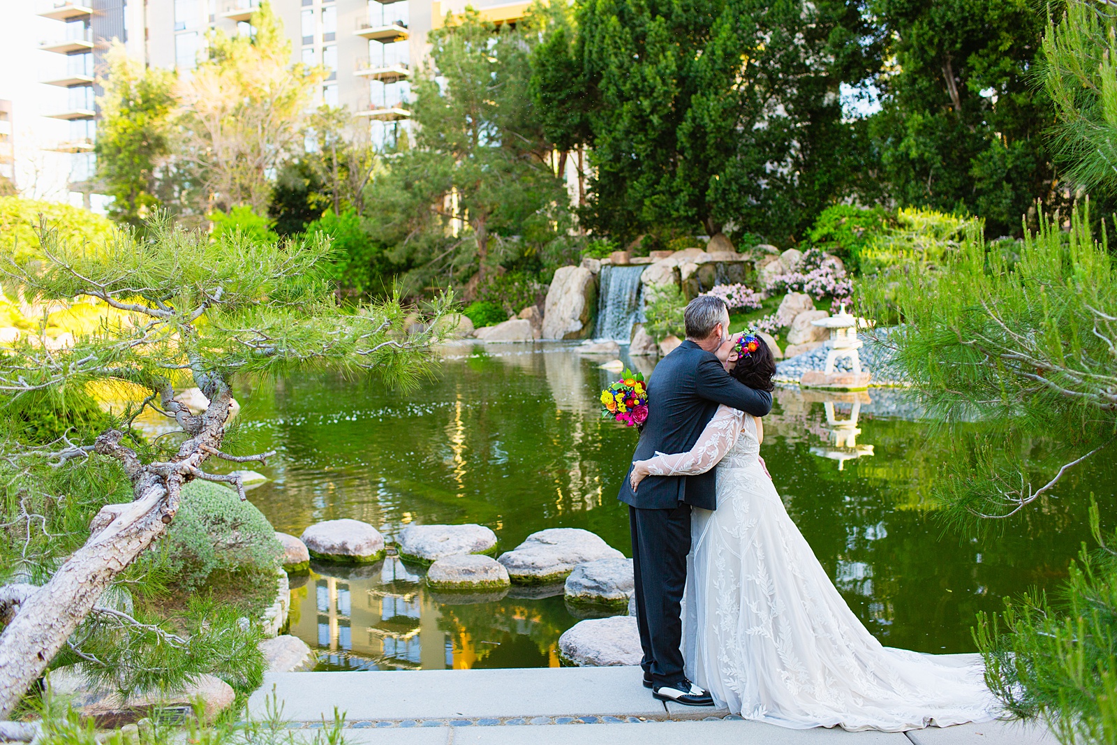 Bride and groom share an intimate moment at their Japanese Friendship Garden wedding by Arizona wedding photographer PMA Photography.