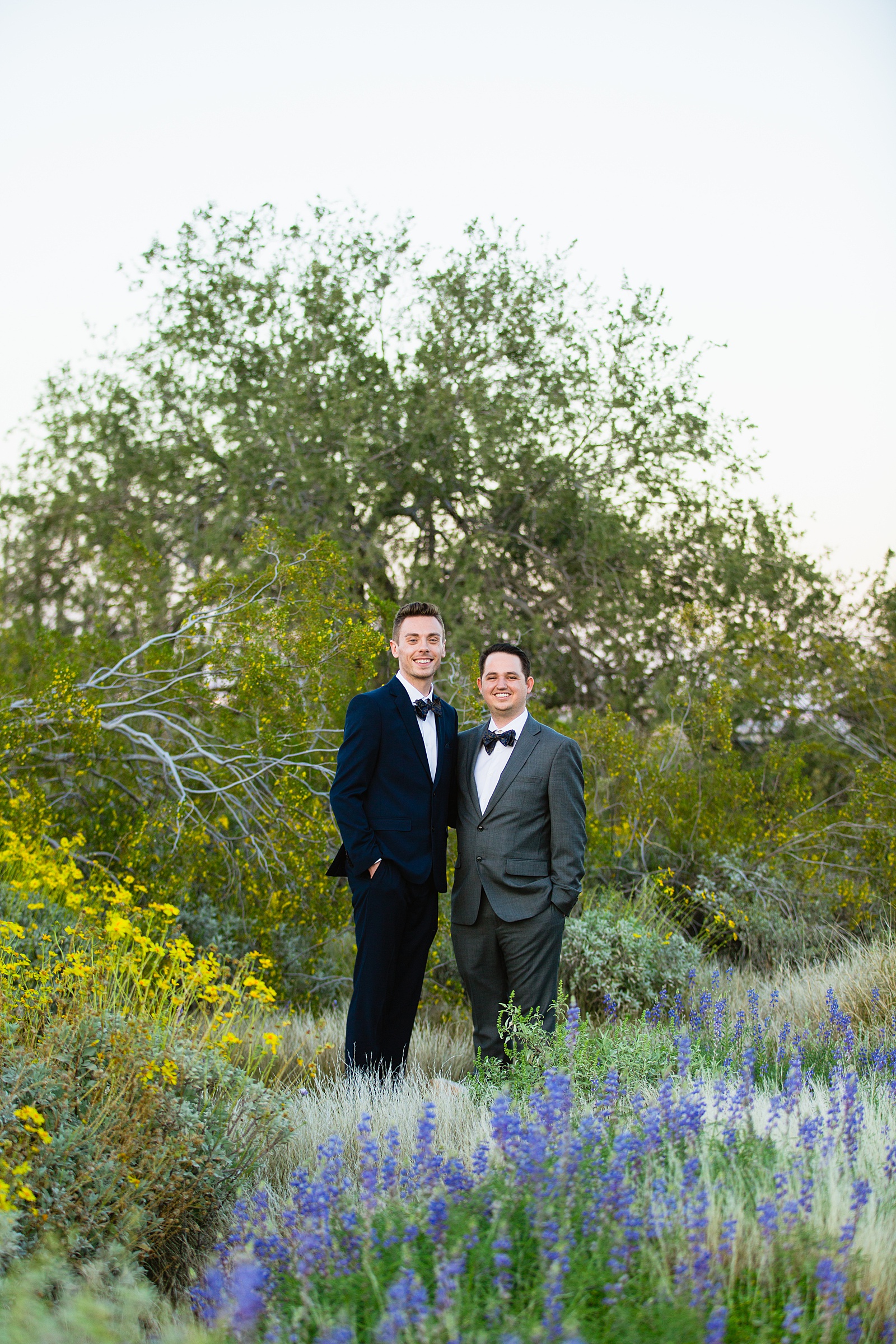 LGBTQ couple pose for their White Tanks elopement by Phoenix elopement photographer PMA Photography.
