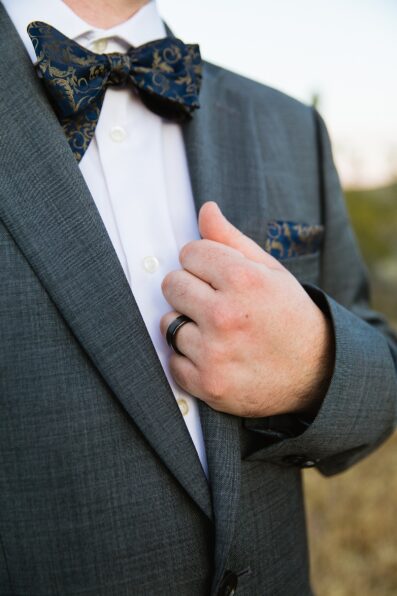 Groom's wedding day details of bow tie and pocket square by PMA Photography.