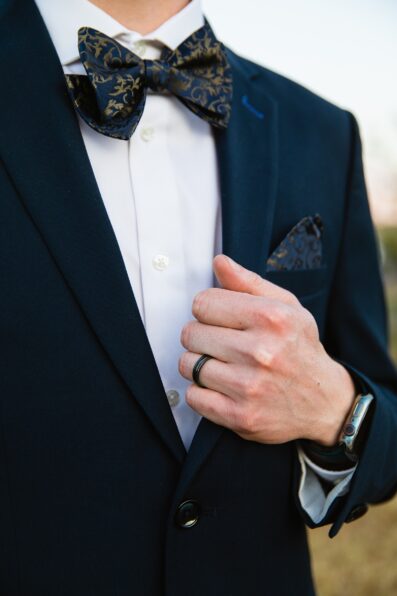 Groom's wedding day details of bow tie and pocket square by PMA Photography.