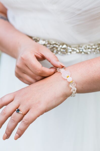 Bride's wedding day details of bracelet by PMA Photography.