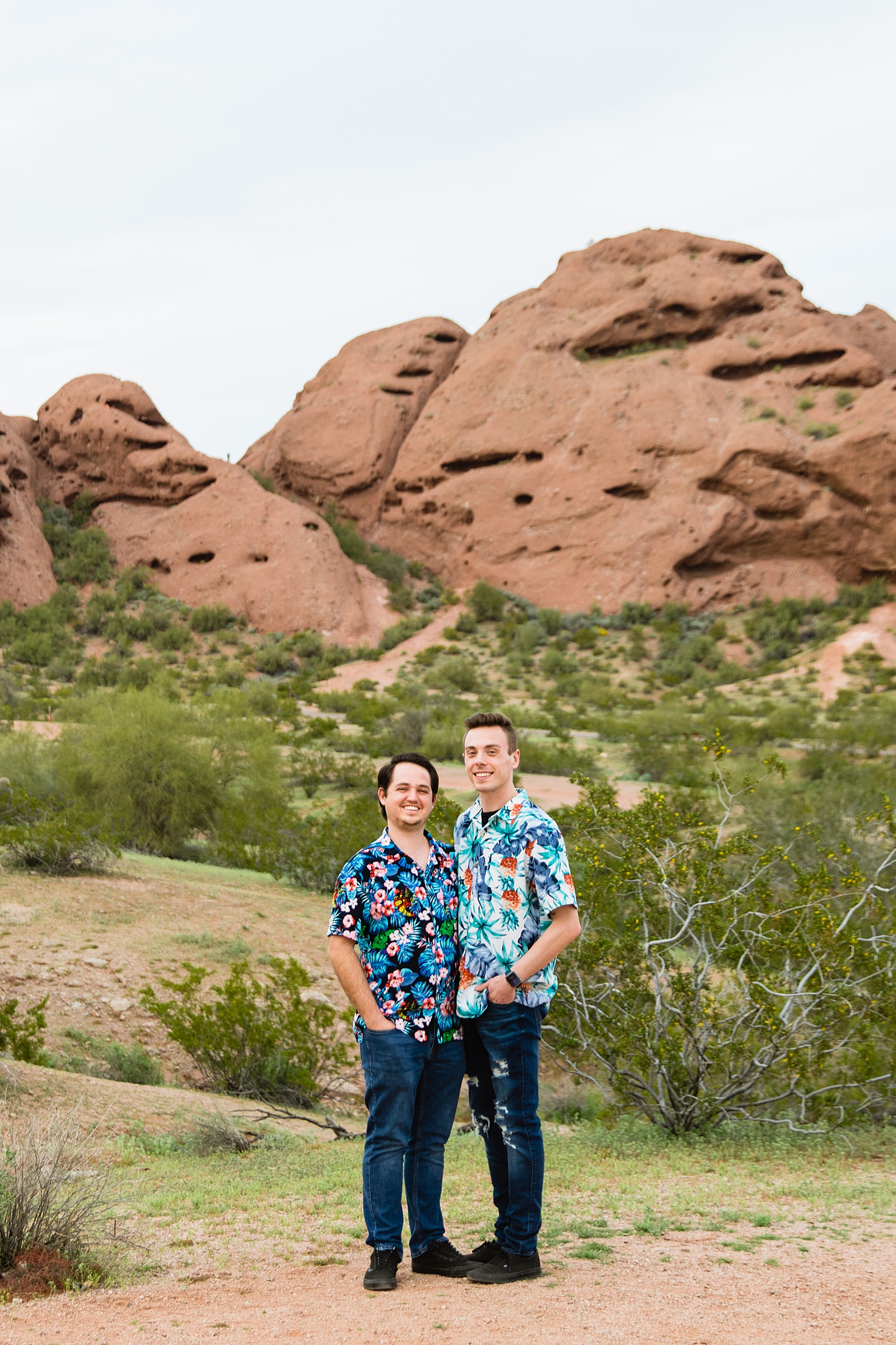Couple pose for their Papago Park engagement session by Tempe wedding photographer Juniper and Co Photography.