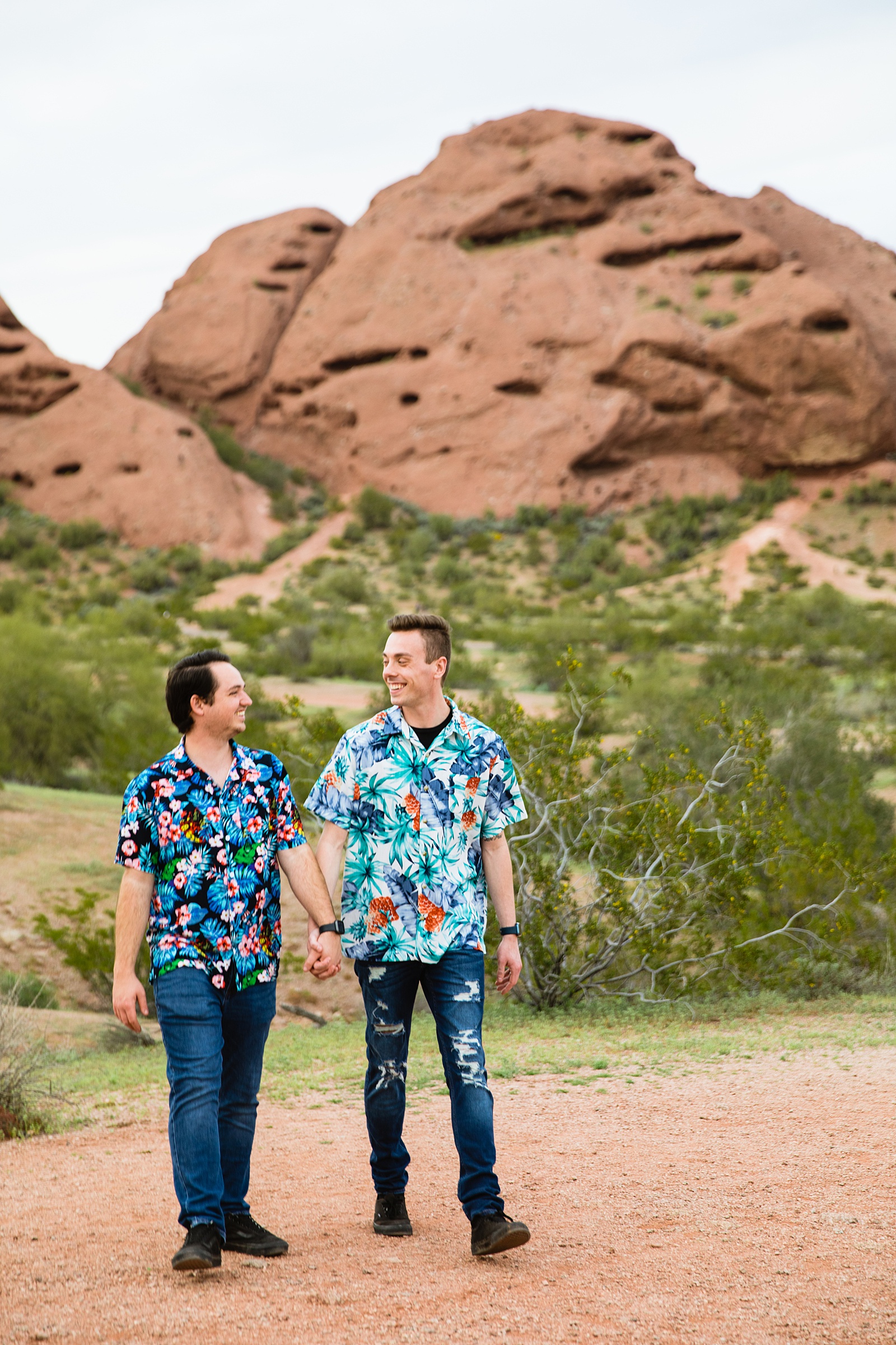 LGBTQ couple walking together during their Tempe engagement session by Arizona engagement photographer Juniper and Co Photography.