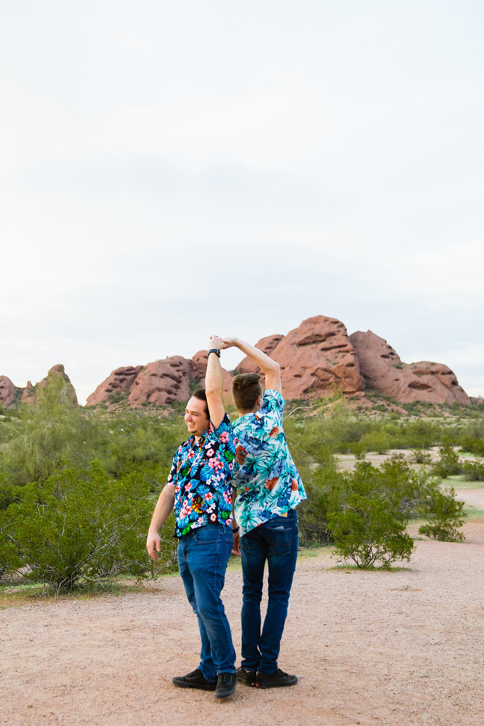 LGBTQ couple dancing together during their Tempe engagement session by Arizona engagement photographer Juniper and Co Photography.