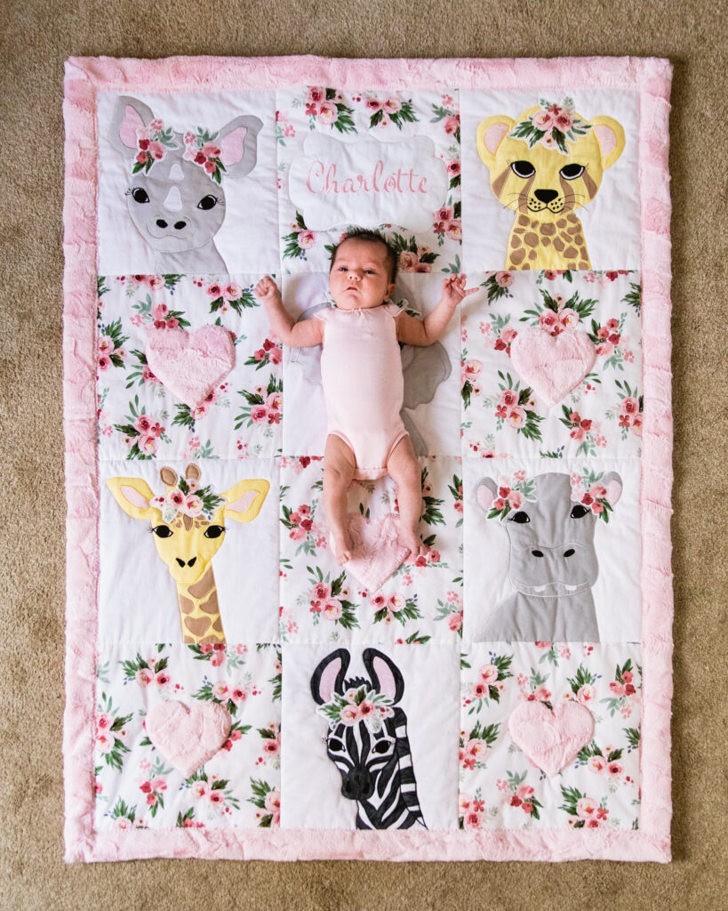 Baby lays on her quilt during Phoenix In-Home Newborn session by Arizona wedding photographer Juniper and Co Photography.