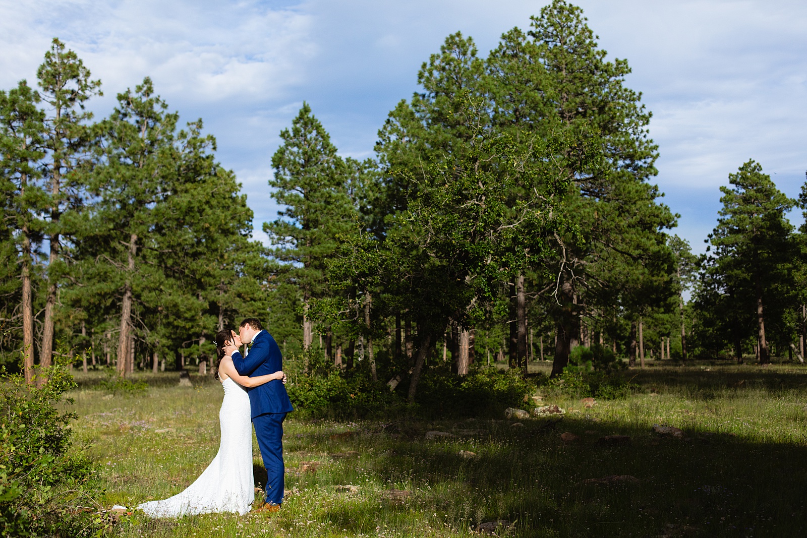 Bride & Groom share a kiss during their Mogollon Rim elopement by Arizona elopement photographer Juniper and Co Photography.