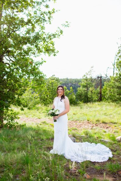 Bride's Art Deco lace wedding dress for her Mogollon Rim elopement by Juniper and Co Photography.