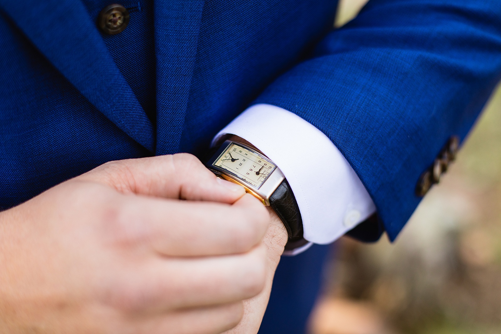 Groom's wedding day details of groom's watch by Juniper and Co Photography.