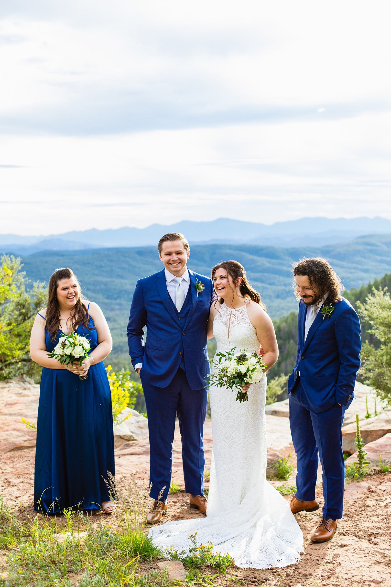 Wedding party laughing together at Mogollon Rim elopement by Payson intimate elopement photographer Juniper and Co Photography.