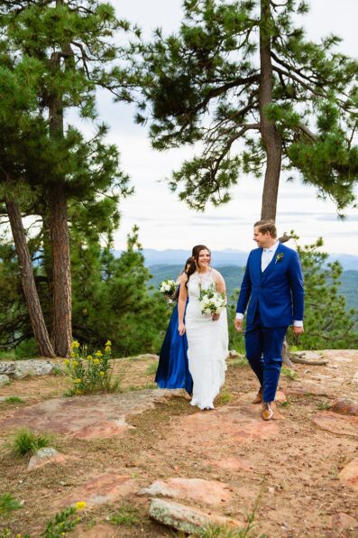 Bride & Groom walking together as newlyweds by Juniper and Co Photography.