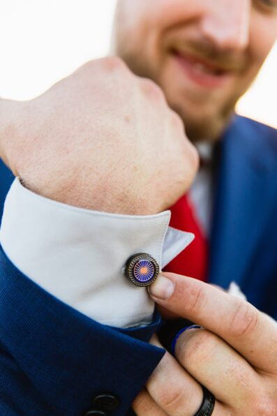 Groom's wedding day details of cuff links by Juniper and Co Photography.