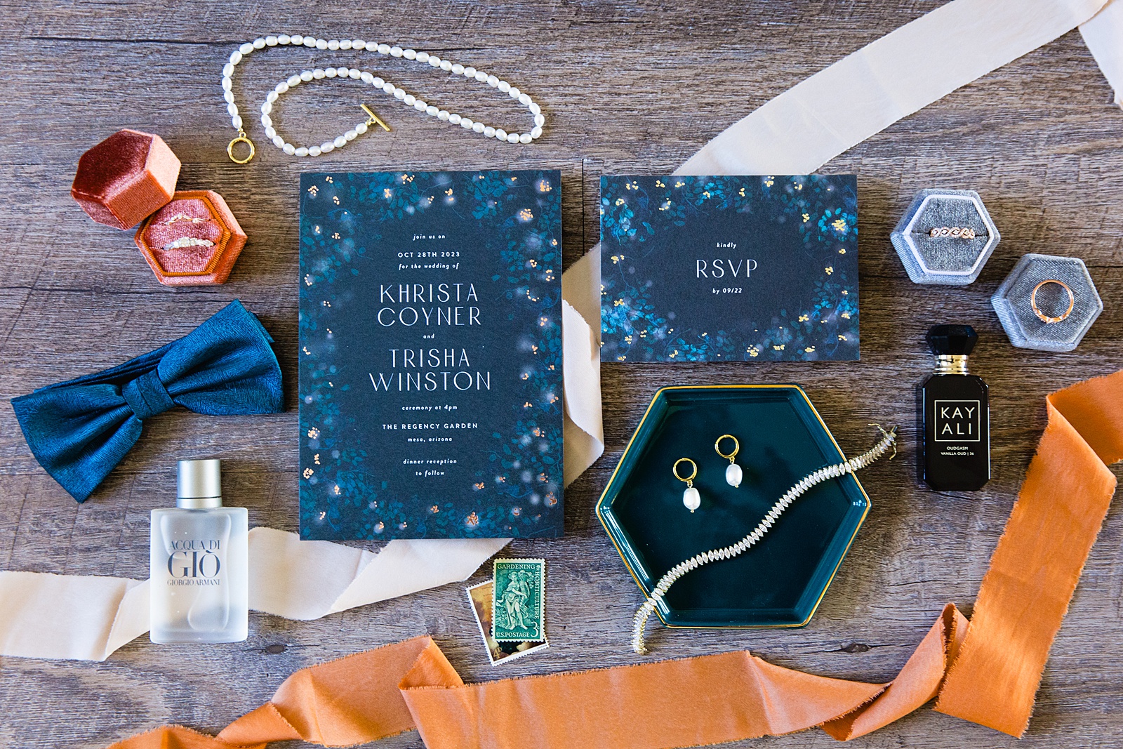 Brides' wedding day details of invitation and accessories by Juniper and Co Photography.
