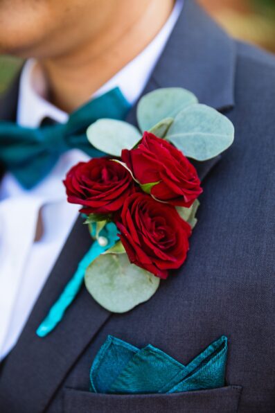 Bride's romantic boutonniere by Juniper and Co Photography.