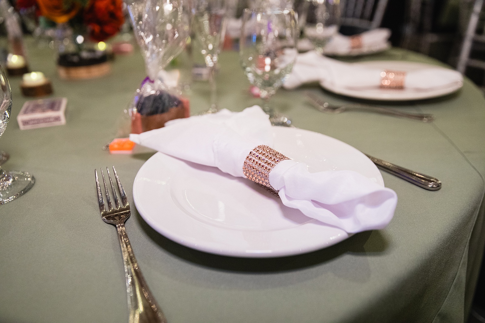 Table settings at Regency Garden wedding reception by Mesa wedding photographer Juniper and Co Photography.